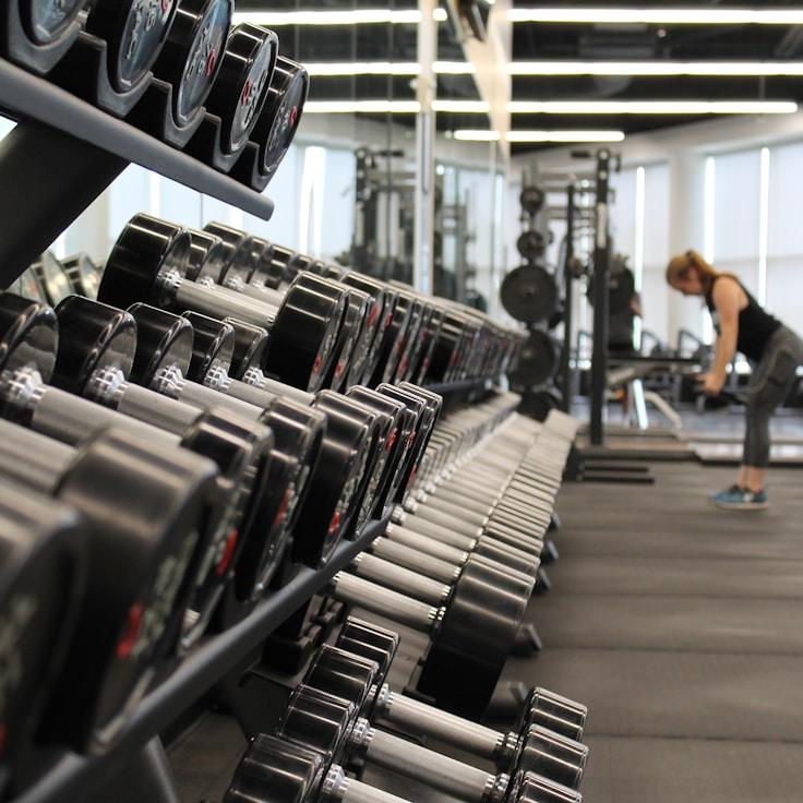 Modern gym equipment in a refined fitness space